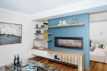 NEFBD60HE-Web-Gallery-02-CLEARion-Elite-60-NEFBD60HE_Life_Media_Rm_Blue_Wall_Glass-Semi