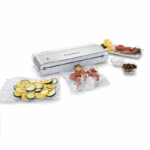 VS1500-foodsaver-white-ss-with-food-group-angle-lifestyle-1-1