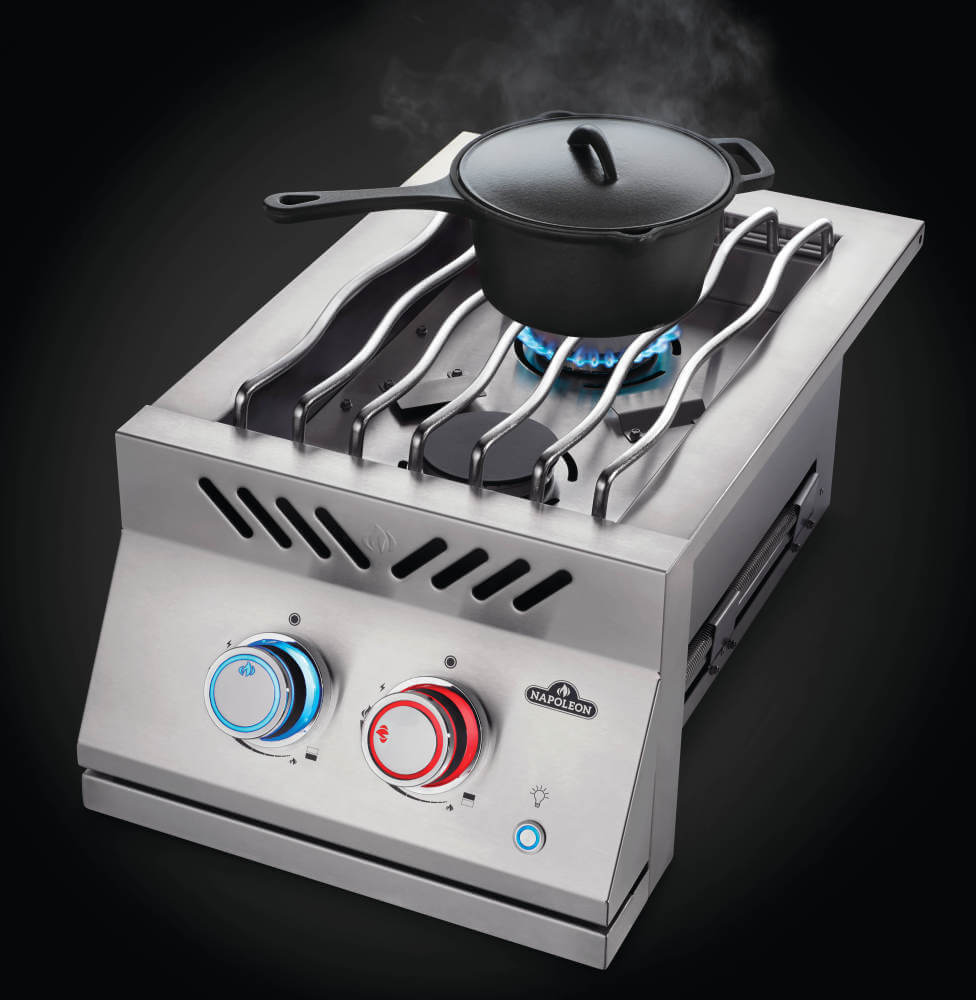 BIB12RTPSS-Web-Gallery-06-Built-in-700-BIB12RT-DropIn-Burner-Prod-Ang-burner-on-Red-lit-knob-Pot